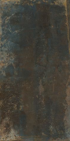 an old, dirty surface is shown in brown and blue tones with some black spots on it