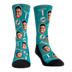 a pair of socks with the faces of two men on them