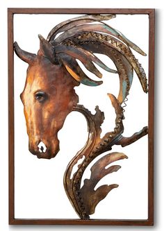 a metal horse head mounted to the side of a wooden framed wall art piece,