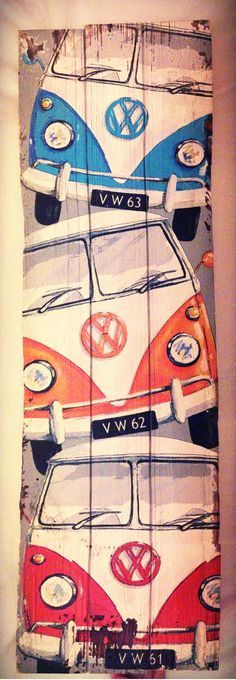 three vw campers are painted on wood