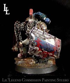 a warhammer is painted with red, white and blue paint on it's body