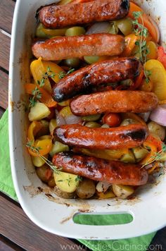 sausages and vegetables in a casserole dish