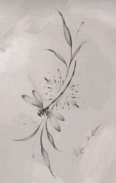 a black and white photo of a flower on a piece of paper with writing underneath it