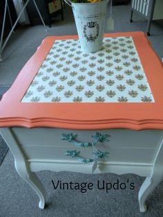 an old table with flowers on it and the words vintage updo's