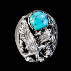 Sterling Silver Ring with Wonderful Silver Eagle and Turquoise Nugget. Circa 1970s. Excellent handcrafted silver work. Marked Sterling.   Size 10  Measures 1" tall  Weight 15.9 grams Available at my Etsy Shop http://Far-Rider-West.com   #western #cowboy #turquoisering #nativeamerican #indianjewelry #Navajo #eaglering #spiritualgifts #westernfashion #mensring #sterlingsilverring #vintagerings #handmadeartisan Native American Eagle, Vintage Turquoise Ring, Western Gifts, Silver Turquoise Ring, Vintage Silver Rings, Silver Eagle, Turquoise Ring Silver, Navajo Jewelry, Silver Work