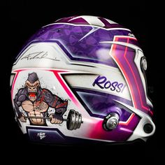 a helmet with an image of a wrestler painted on the front and side of it