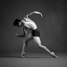 a male ballet dancer in black and white