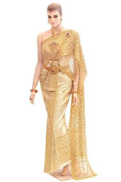 a woman in a gold sari