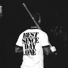 black and white photograph of a man holding a baseball bat in his right hand with the words best since day one printed on it