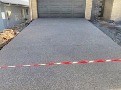 An image of driveway Clean Concrete, Concrete Resurfacing, Concrete Finishes, Driveway Design, Concrete Contractor, Concrete Driveways