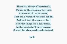 a poem written in blue ink with the words, there's a history of heart break