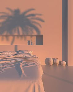 a bedroom with a palm tree in the corner