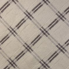 a white and black checkered fabric with lines