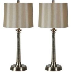 a pair of lamps sitting next to each other