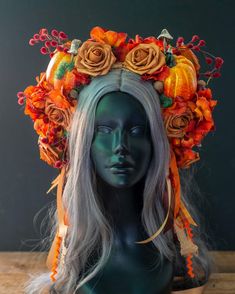 Step into a realm where autumn whispers secrets of magic and beauty with our exquisite Harvest Pumpkin Queen Headdress. This one-of-a-kind masterpiece is an essential adornment for any ethereal fairy costume, autumn festival attire, or regal celebration, be it a Mabon gathering, outdoor wedding, or sacred handfasting ceremony. Crafted for comfort, this lightweight headpiece is designed to embrace you throughout your enchanting day, ensuring you radiate elegance from dawn until dusk. Inspired by the whimsical charm of nature, this cottage witch headdress marries vintage allure with modern artistry. The foundation of this enchanting piece features delightful vintage foam core pumpkins, intricate trims, and delicately cast resin mushrooms, weaving a tapestry of nostalgia and wonder. Adorning Fall Fairy Costume, Witch Headdress, Festival Headdress, Spirit Costume, Handfasting Ceremony, Hand Fasting, Fall Fairy, Ethereal Fairy, Autumn Spirit