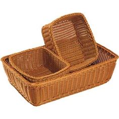 two wicker baskets sitting on top of each other