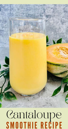 a glass filled with orange juice next to sliced melon