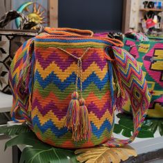 One Of A Kind Indigenous Colombian Mochila. When The Wayu Tribe Makes These Handbags They Set The Intention To Put Something Unique Into The Universe. Their Creations Are All "One Of Kind" Items. We Have Been Collecting Them For Over 8 Years And Have Never Seen Two Exactly Alike. So You Are Purchasing A Truly One Of A Kind Item. Which Makes For A Very Unique Gift For Yourself Or Your Loved Ones. Pink Backpack For Vacation, Multicolor Bucket Bag With Adjustable Strap, Multicolor Crochet Shoulder Bag With Adjustable Strap, Multicolor Shoulder Bucket Bag With Adjustable Strap, Pink Crochet Bucket Bag With Adjustable Strap, Bohemian Pink Bucket Bag, Bohemian Multicolor Bucket Bag With Adjustable Strap, Multicolor Woven Crossbody Bucket Bag, Multicolor Bucket Shoulder Bag With Adjustable Strap