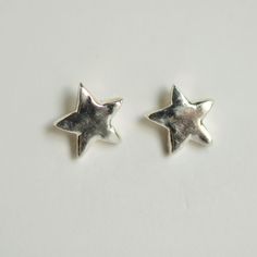 Celestial twinkling star stud earrings. Sterling silver ear posts and ear nuts on both bronze and sterling silver metal finish options. Each piece is made by hand with metal clay and kiln fired and finished to this beautiful and unique piece of solid metal jewelry. As with any handmade item, variations are to be expected and enjoyed! *Bronze is composed of 90% copper and 10% tin and is nickel free. Celestial Earrings Sterling Silver, Star Earrings Stud Silver, Unique Clay Stud Earrings, Dainty Metal Jewelry, Star Stud Bracelet, Silver Stud Earrings Handmade, Logam Mulia, Silver Clay, Star Stud Earrings