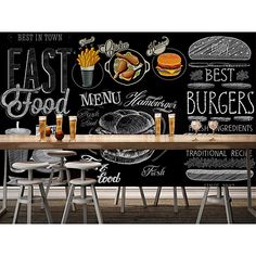 a chalkboard wall with food and drinks on it