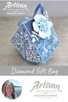 a blue and white gift bag with flowers on it, next to a photo of a woman