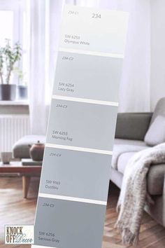 a living room with white walls and wood floors is shown in this color swatch