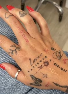 a woman's hand with tattoos on her left and the words i love you written on it