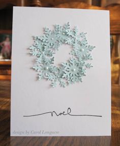 a card with a snowflake design on it