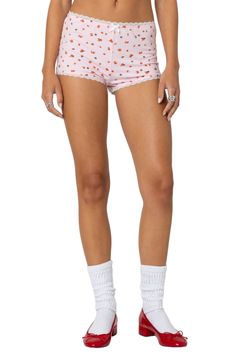 A dainty strawberry print decorates these stretchy cotton shorts designed in a leggy length with scalloped lace trim and a low-rise waist. Pull-on style 95% cotton, 5% spandex Machine wash, dry flat Imported Cute Fitted Bottoms With Built-in Shorts, Fitted Bottoms With Built-in Shorts In Cute Style, Cute Fitted Cotton Bottoms, Cute Fitted Short Bottoms, Cute Fitted Short Length Shorts, Cute Stretch Cotton Bottoms, Cute Fitted Shorts, Cute Stretch Bottoms Of Short Length, Casual Pink Bottoms With Strawberry Print