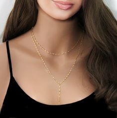 "Gold Beaded Lariat Necklace, Minimal Necklace, Gold or Silver Lariat, Beaded Necklace, Girlfriend Gift, Y Necklace  Gold or Silver Lariat Necklace This Y Necklace is absolutely adorable Makes an everlasting impression with its chic style and eye catching beads.  * High Quality Gold  or Silver Plated over brass Satellite Chain  * Each bead is 3mm spaced every 1\" * Photo #1 is shown at 16\" To View More Lariat Necklaces, Click Here: https://www.etsy.com/shop/SimpleAndLayered?section_id=16420368&ref=shopsection_leftnav_3 All orders are sent packaged in a jewelry box - ready to be gifted! Upon request, we can also include a note card with your own personal message. PLEASE NOTE: In an effort to be greener and to keep shipping costs down, your order will arrive in ONE (1) gift box regardless o Gold Plated Clavicle Chain Layered Necklace For Party, Gold Plated Layered Clavicle Necklace For Party, Gold Plated Layered Necklace With Clavicle Chain For Party, Party Gold Plated Layered Necklace With Clavicle Chain, Lariat Necklaces With Satellite Chain For Gifts, Elegant Double Chain Lariat Necklace Gift, Elegant Double Chain Lariat Necklace As Gift, Elegant Lariat Necklace With Double Chain As Gift, Gold Dainty Necklace With Adjustable Length