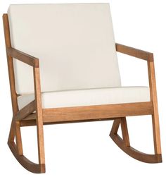 a wooden rocking chair with white fabric on it's back and armrests