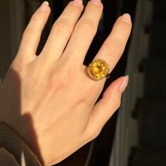 Estate/ vintage 14KT yellow gold halo style ring with round, faceted, genuine, large citrine gemstone and diamonds. Size 7.25 Can be resized for an additional fee Weight: 11 grams Genuine, round-cut citrine, faceted measures: 14.70 mm Stamped 14K and Effy Diamonds: .15 CT SI clarity, G/H color Excellent estate condition Stunning, warm color! November Baby, Saint Jewelry, Halo Style, Gold Halo, Citrine Gemstone, Rings Cool, Halo Diamond Ring, Halo Rings, G H