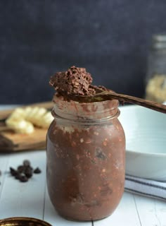 a jar filled with brownie batter overnight oats