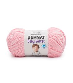 bernat baby velvet yarn ball in pink, on a white background with the label