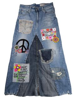 a pair of jean shorts with patches and peace signs on them, all in different colors