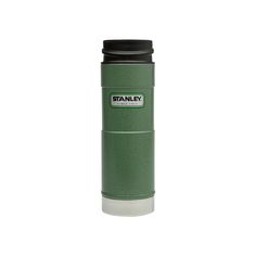 the stanley travel mug is green and black