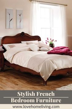 a bed room with a neatly made bed next to a window and wooden flooring