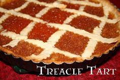 a tart dish is shown on a red tablecloth with the words traece tart written below it