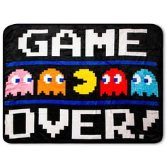 a blanket that says game over with four pacman characters on the front and back