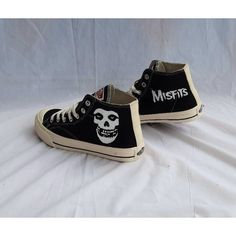 Introducing our 'Unique Hand-Painted Misfits Punk Rock Band Shoes: A Street Art Collection' - where fashion meets rebellion, and style gets a punk rock makeover. These custom sneakers are not just footwear; they are a canvas of individuality and self-expression. Our personalized gift to you is the freedom to wear your passion. Each pair is a masterpiece, meticulously hand-painted with iconic Misfits artwork, infusing punk rock style into every step you take. These shoes are a tribute to the legendary rock band, capturing their spirit in wearable art. Elevate your fashion game with these running shoes that embody the rebellious ethos of punk rock culture. They are more than just sneakers; they are a statement. Perfectly blending street art and rock 'n' roll vibes, these shoes are your ticke Alternative Black Sneakers For Streetwear, Black Punk Sneakers For Concert, Black Punk Sneakers For Streetwear, Alternative High-top Sneakers For Streetwear, Misfits Artwork, Casual Halloween Skateboarding Sneakers, Casual Sneakers For Concert With Round Toe, Casual Sneakers With Round Toe For Concerts, Misfits Art