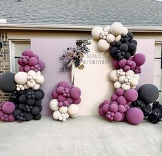 balloons are arranged in the shape of letters