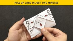 two hands holding an origami piece with the words pull up card in just two minutes