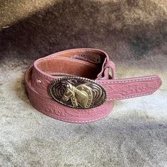 "90s western cowgirl pastel pink tooled leather belt with horse buckle  by Nocona size listed 26\"   Measurements 23\" - 27\"  In great condition looks like new" Western Belts With Antique Buckle And Adjustable Fit, Western Belt With Antique Buckle And Adjustable Fit, Vintage Adjustable Belts For Rodeo, Vintage Adjustable Belt For Rodeo, Adjustable Vintage Belt For Rodeo, Vampire Barbie, Homesteading Animals, Pony Rider, 90s Western