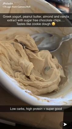 a white bowl filled with batter on top of a table