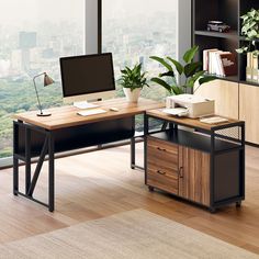 an office desk with a computer on it in front of a window overlooking the city