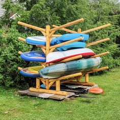 outdoor kayak storage Paddleboard Storage, Kayak Rack Diy, Paddle Board Storage, Canoe Rack, Surfboard Storage, Landscaping Blocks, Kayak Storage Rack, Northern White Cedar, Kayak Storage