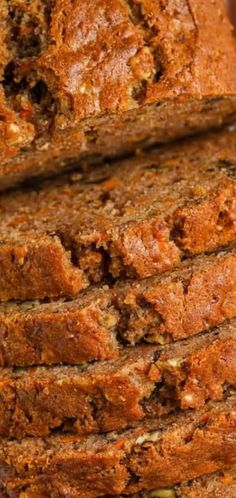 sliced loaf of banana bread sitting on top of a cutting board