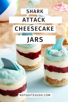 three small jars filled with cheesecake and blueberries