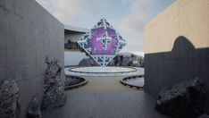 an artistic sculpture is shown in the middle of a courtyard with rocks and boulders surrounding it