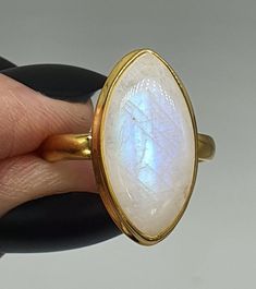 Rainbow Moonstone Ring, Size 10, Sterling Silver, 14k gold plated, Marquise Shape, Goddess Stone, Psychic Protection, Calm Sleep, Soul Stone Exquisite Marquise shaped, Rainbow Moonstone ring The Rainbow Moonstone has been bezel set in 925 Sterling Silver & 14K gold Electroplated  Such a Stunning ring that flashes blue Size 10 US Size T1/2 AUS Rainbow Moonstones measure 21 mm long by 11 mm wide, 8mm depth 6.2 grams  Pick up Augustine Heights 4300 or can post anywhere in Australia / World with tra Soul Stone, Psychic Protection, Rainbow Moonstone Ring, Size 10 Rings, Moonstone Ring, Moon Stone, Rainbow Moonstone, Rings Statement, Psychic